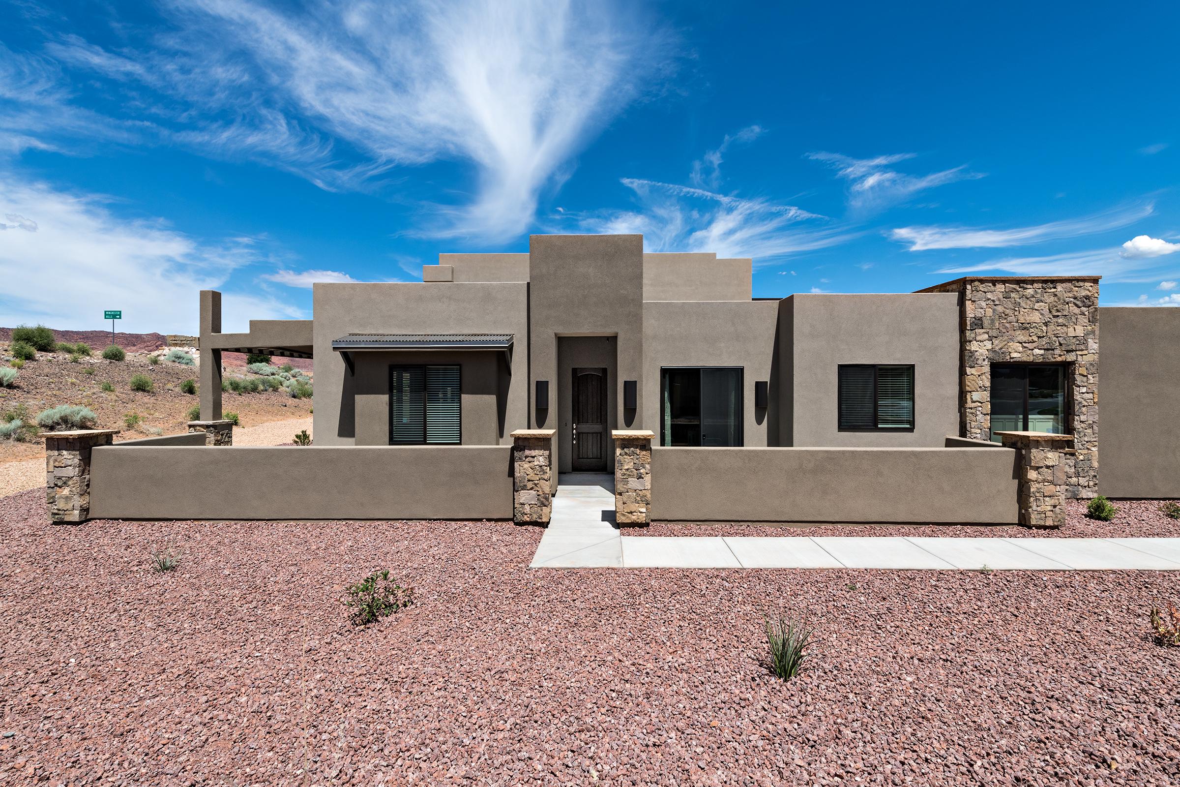 The side view of this beautiful home is also the entry way. 