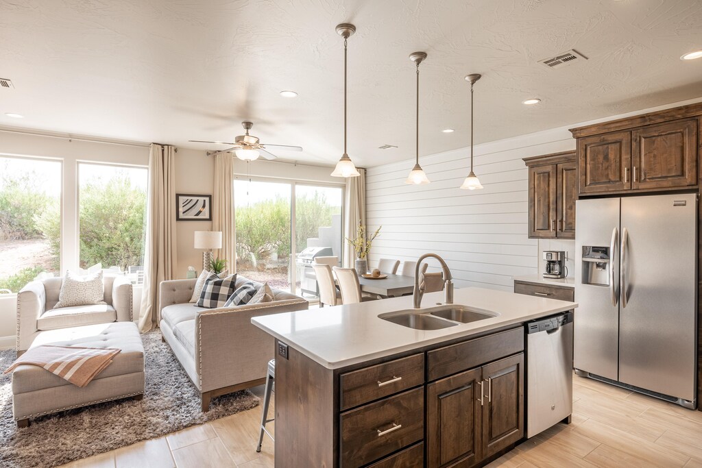 The kitchen is fully stocked with all the dishes, cookware, baking pans, and cutlery you will need for meal preparations and includes stainless steel appliances and granite counter tops.