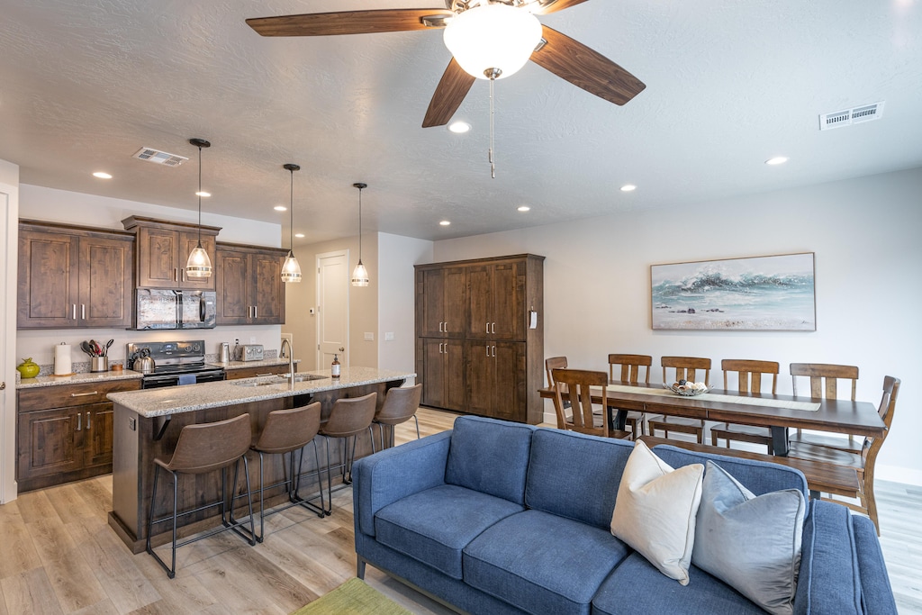 The Kitchen Island comfortably seats 4 adults and creates a great space for serving and preparing meals.