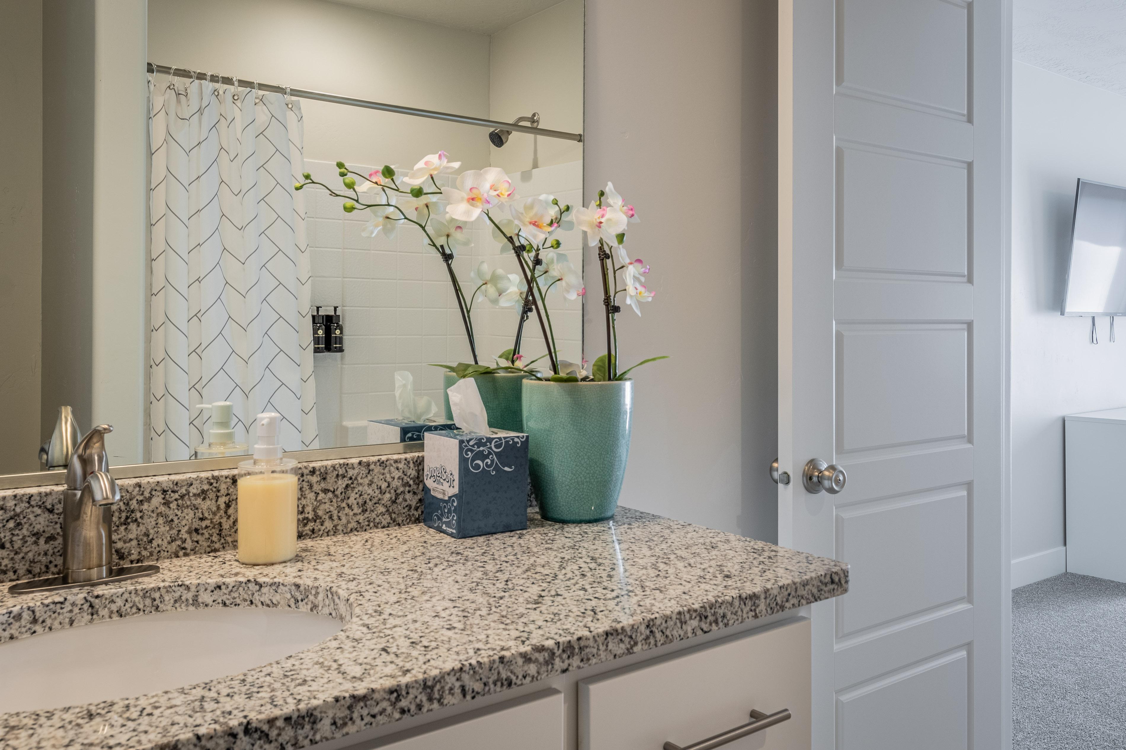 Bathroom 3 includes a tub/shower combo, sink, toilet, and vanity.