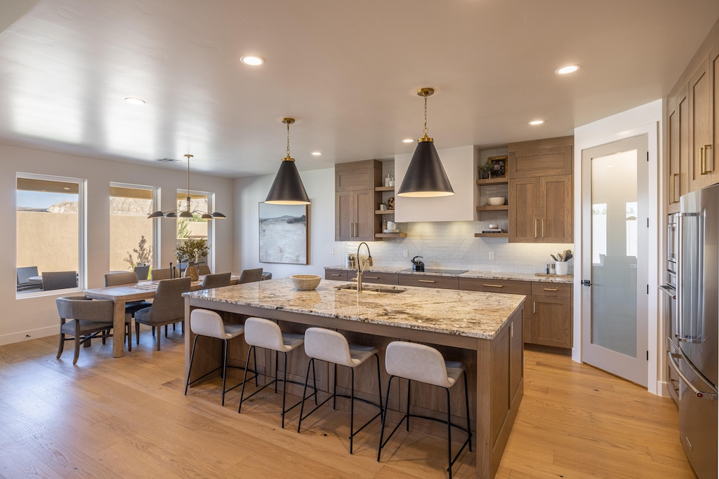 The Kitchen Island comfortably seats 4 adults and creates a great space for serving and preparing meals.