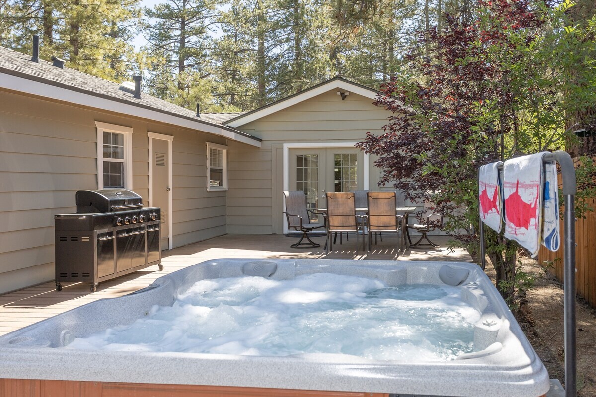 Relaxing Jetted Spa and propane BBQ in the private backyard deck.