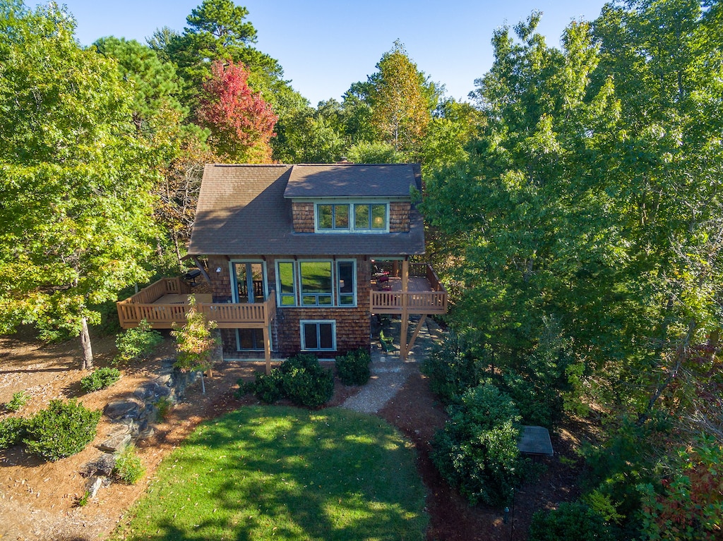 Backyard view with pops of fall color surrounding Hully Gully