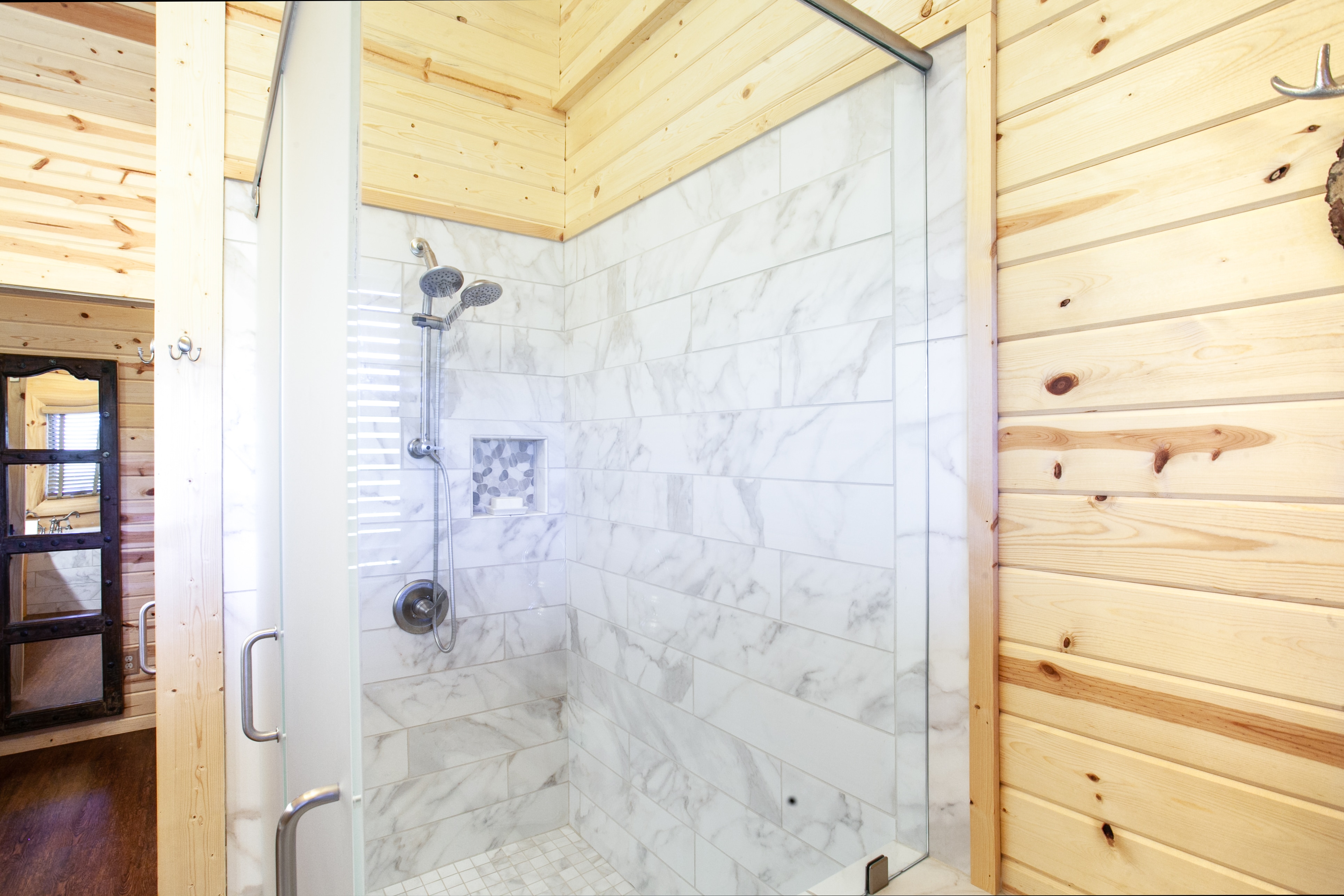 Main-level queen bedroom ensuite with walk-in shower only Main-level queen bedroom ensuite with walk-in shower only