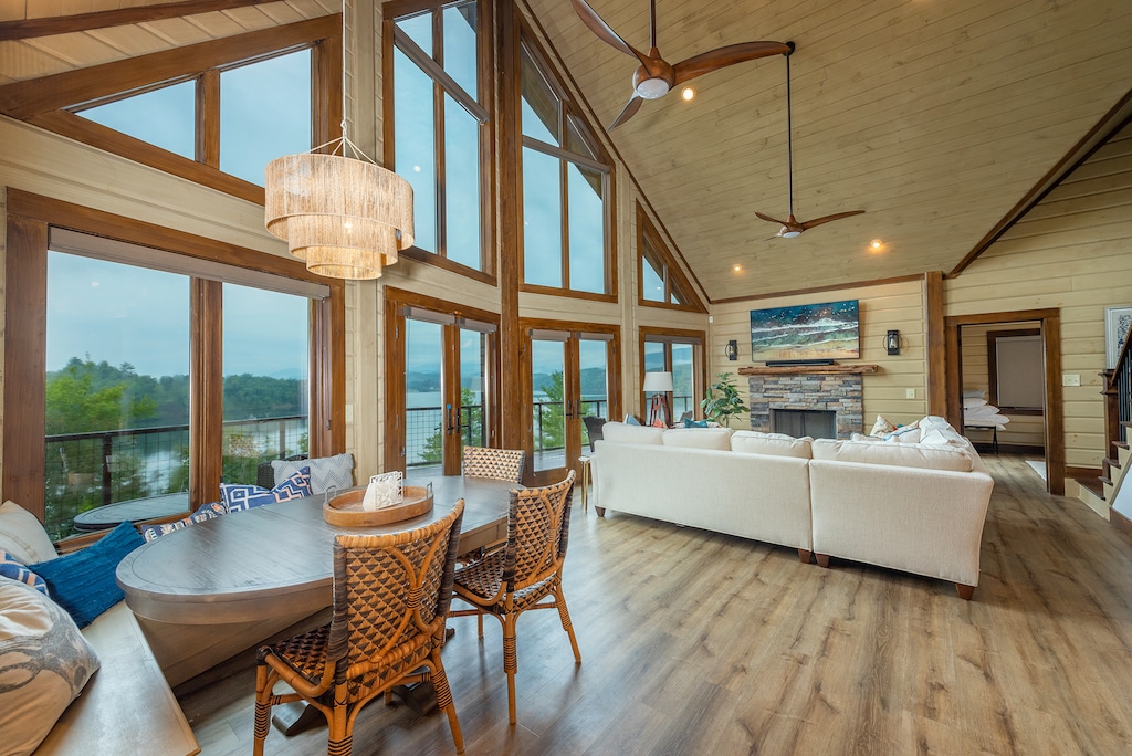 Floor-to-ceiling lakefront views from the living & dining areas.