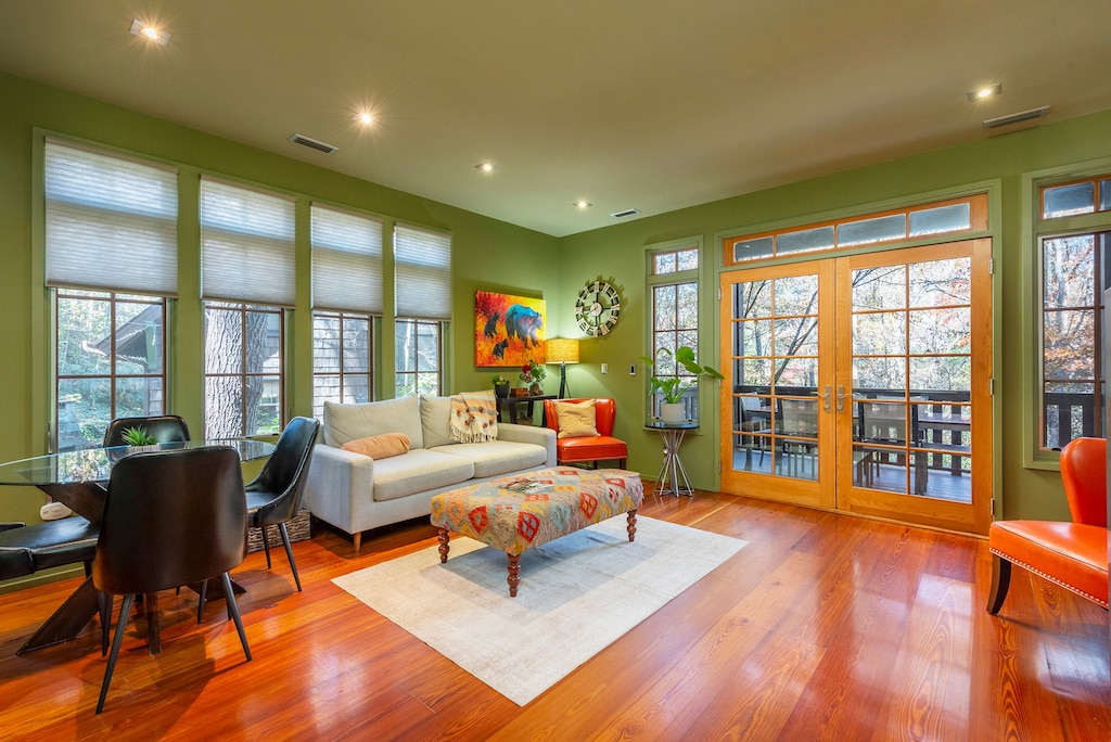 Open living room area with gas log fireplace and TV (cable and streaming available).