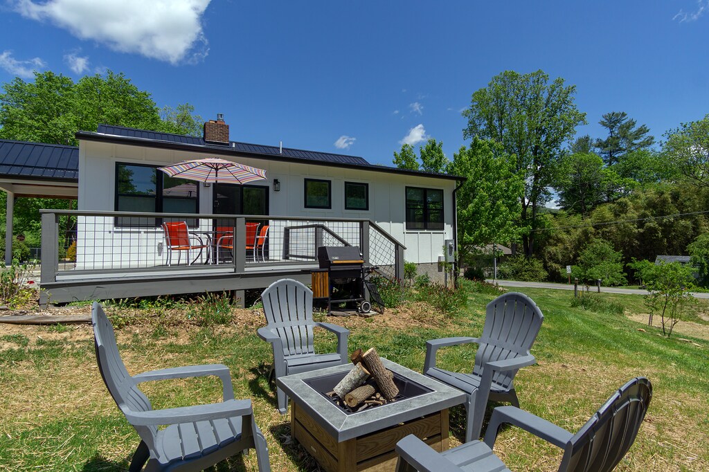 Fire pit with seating and spacious deck with dining table for 6