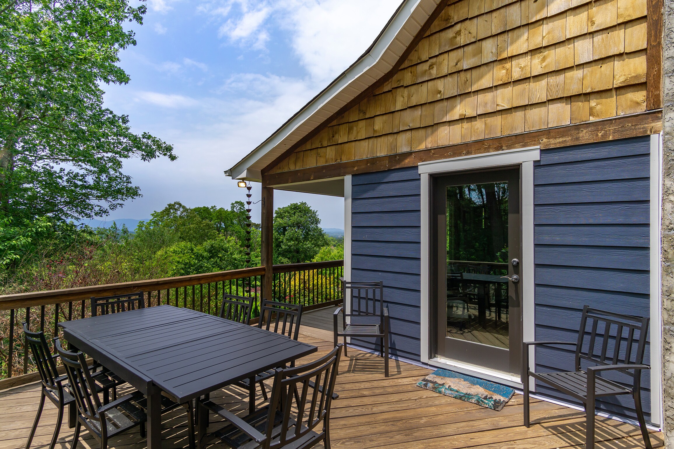 Enjoy distant views of the Blue Ridge Mountains while dining al fresco on the deck.