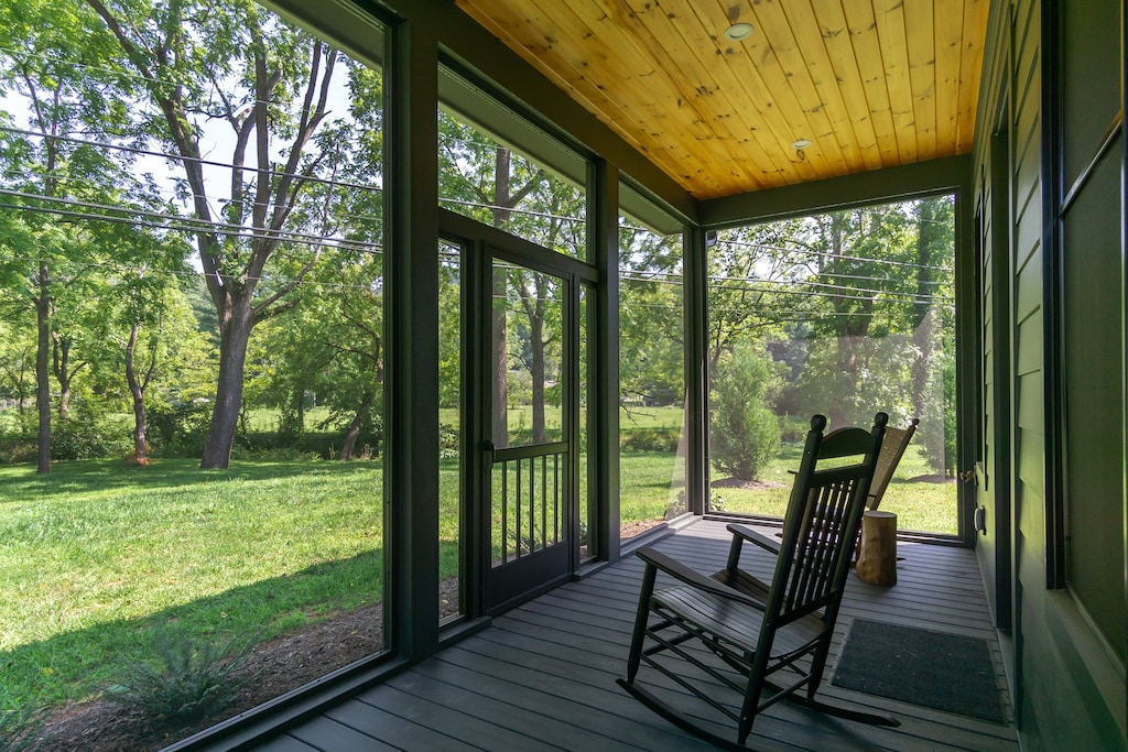 Enjoy morning coffee in the rocking chairs on the screened porch while listening to the creek.