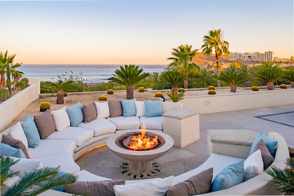 Firepit with outdoor seating and ocean views