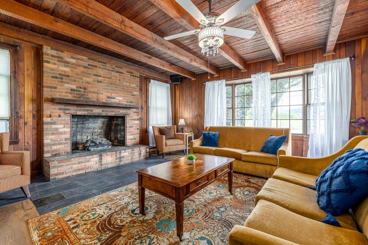 Living room with decorative fireplace