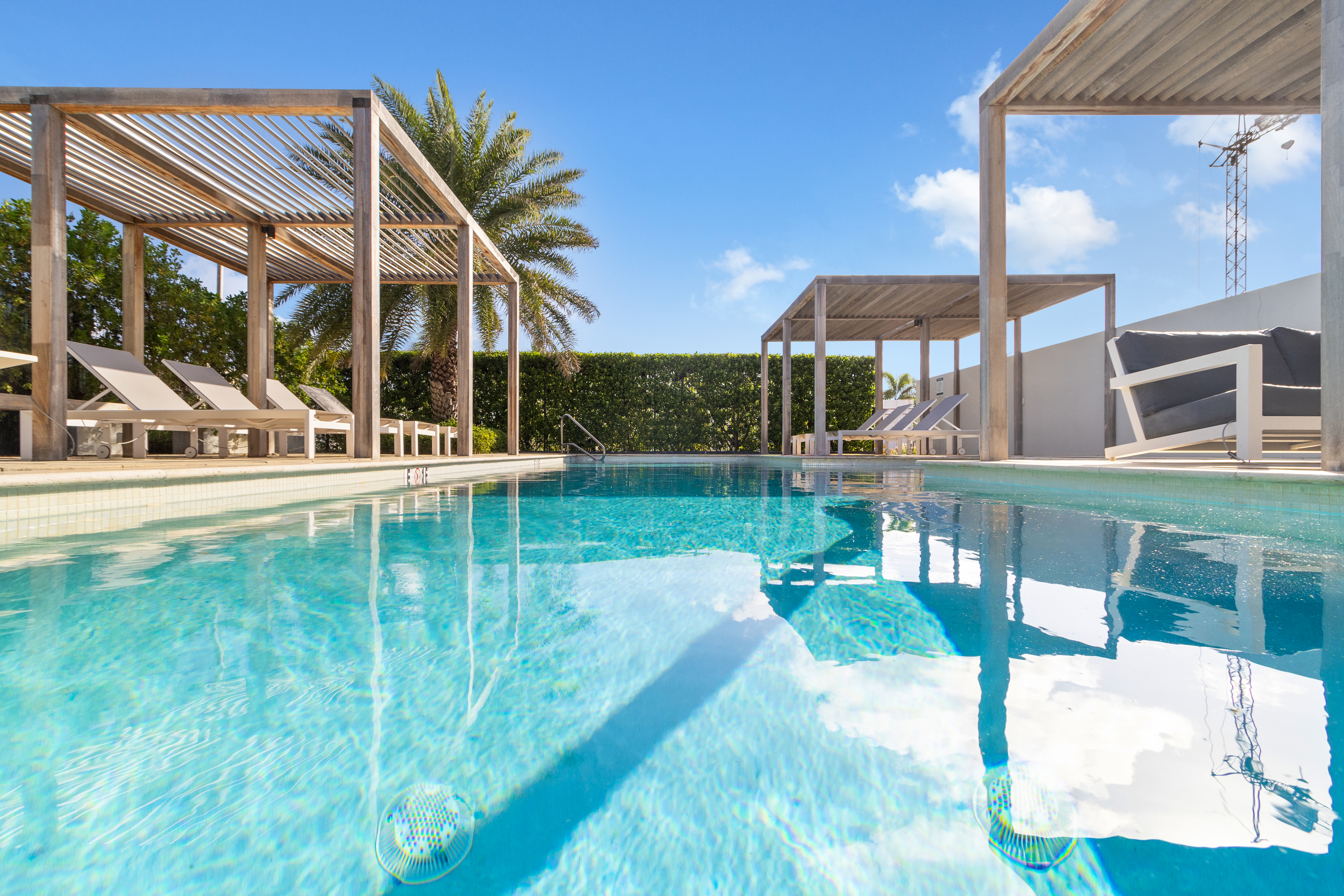 Beautiful shared Pool in Tropical Garden - A splash of nature's beauty - Ample space for enjoying fresh air and sunshine. - Lounge in tranquility by the sparkling waters - Take in the fresh air in our peaceful Pool