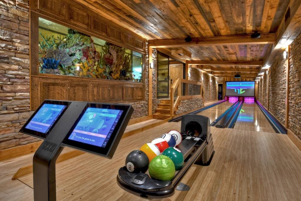 Enjoy private bowling lanes with laser lights and a 3000 gallon fish tank