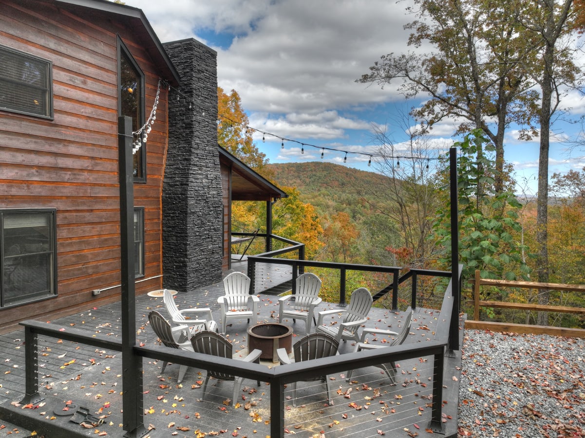 Crackling firepit overlooking views of the Aska Adventure Area