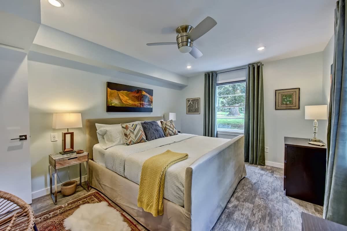 Luxurious king size bed in a comfy master bedroom