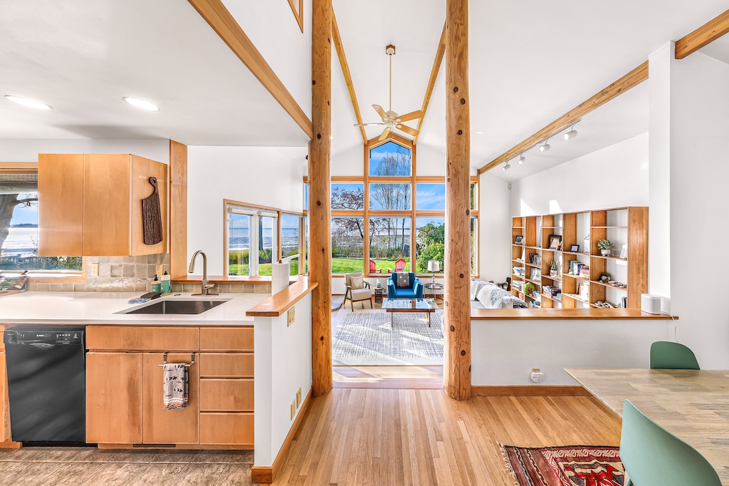 Bask in the warmth of natural light and rustic charm flowing seamlessly through the open-concept design.