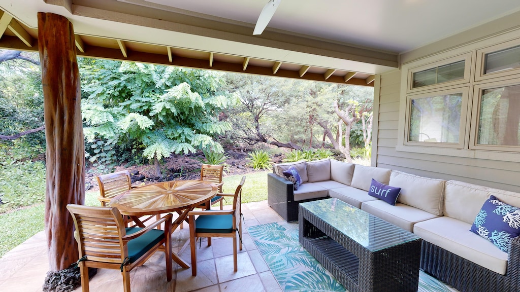 Lots of room for relaxing on the lanai with comfortable seating and dining