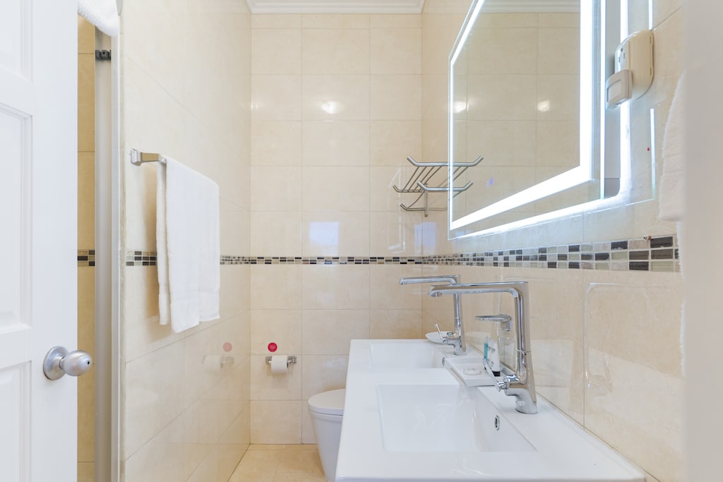 Private balcony of the 2BR Condo in Noord Aruba - Easy access to a private balcony for outdoor moments - Scenic private balcony for relaxation - Extend living space for outdoor leisure