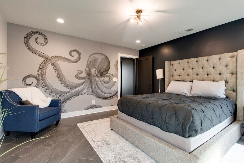 The first-floor bedroom offers a tranquil retreat of comfort.