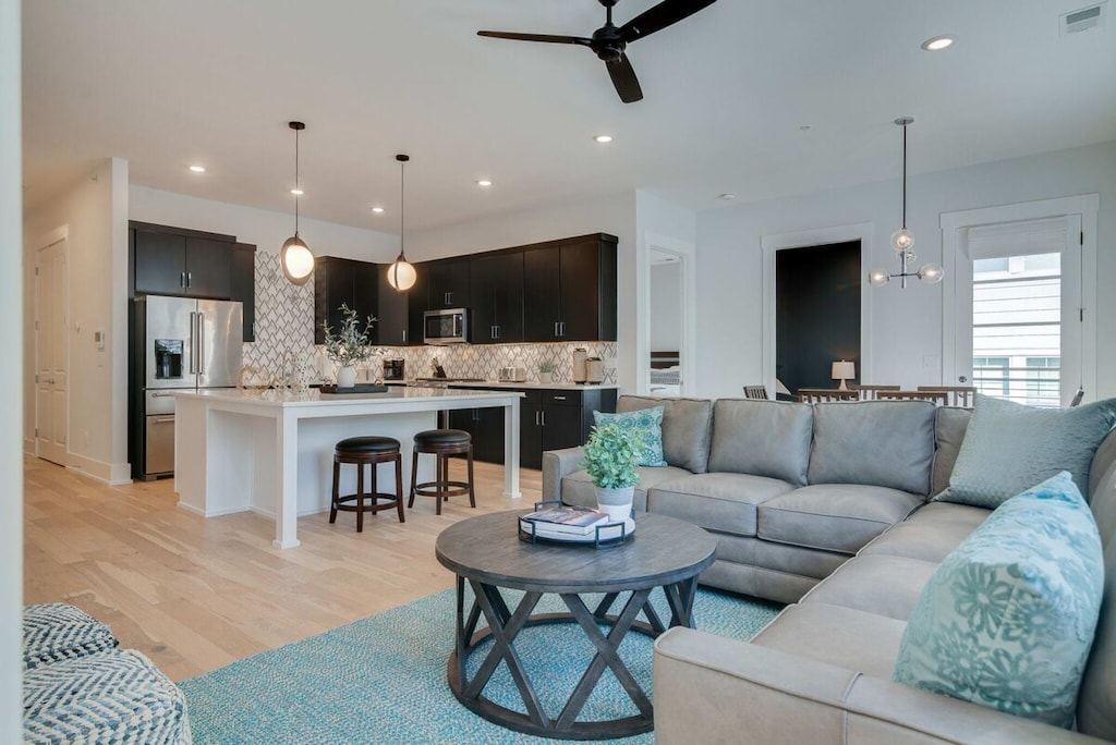 Welcome to The Briar, your Nashville escape starts here in this bright, open living and kitchen space designed for gathering and relaxing.