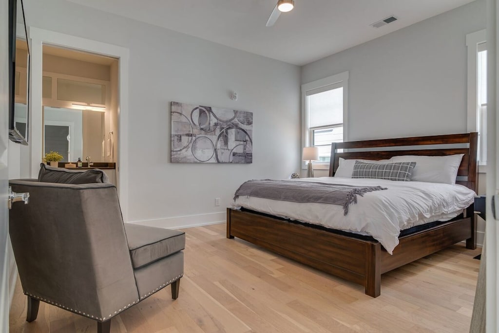 Relax in this inviting king bedroom, where simplicity meets comfort. 