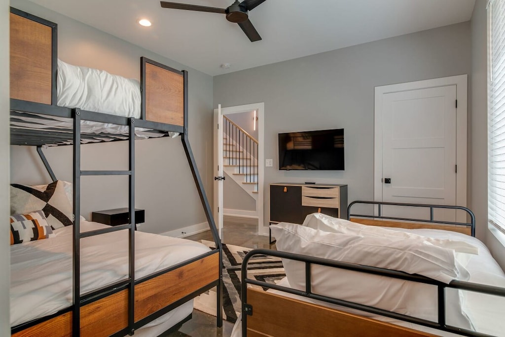 Enjoy the ample space of this inviting room, equipped with a TV for your entertainment needs—perfect for relaxation or catching your favorite shows.