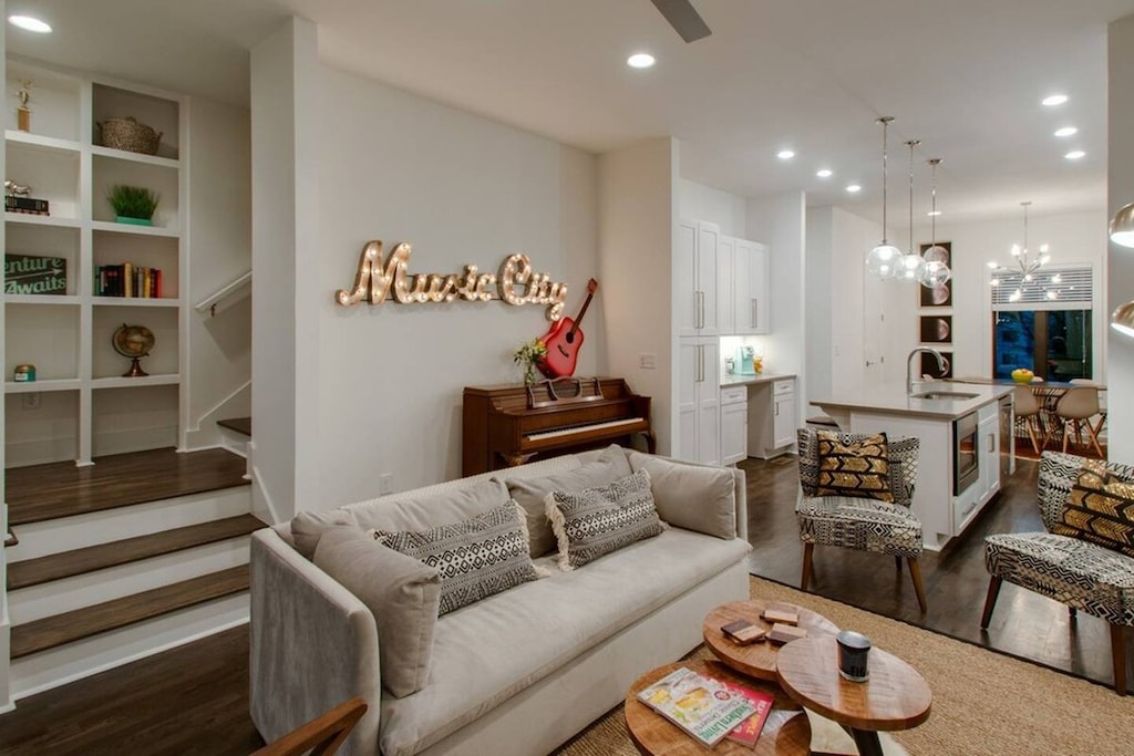 The spirit of music runs through the home, highlighted by decorative guitars and a piano.