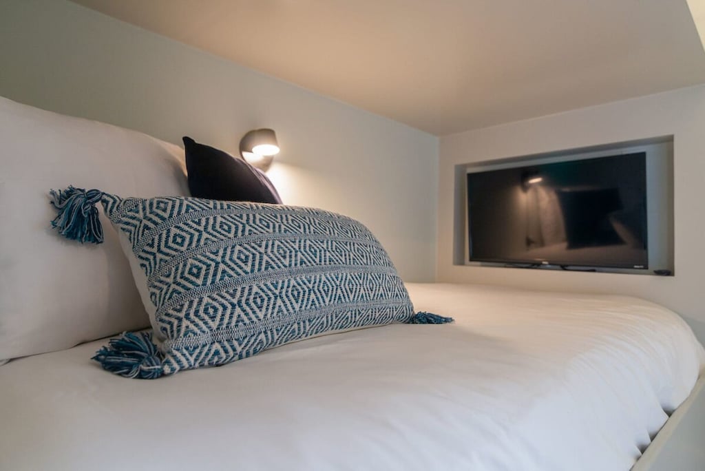 Each custom-built bunk bed has its own Smart TV!