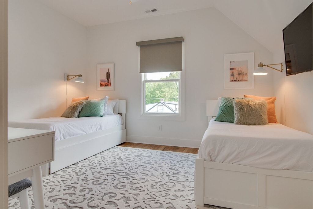 This room truly has it all--Smart TV's, a vanity, and sleeping for 4!