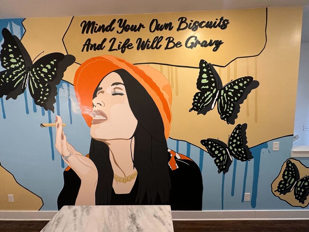 Strike a pose in front of our custom mural, an Instagram-worthy backdrop made for memorable moments!