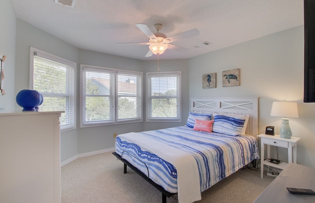 Bedroom 2 features a queen bed