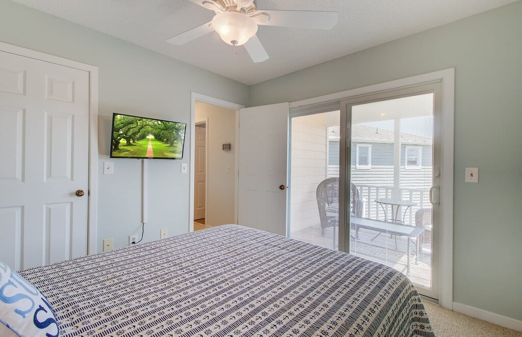 Bedroom 3 features a queen bed.