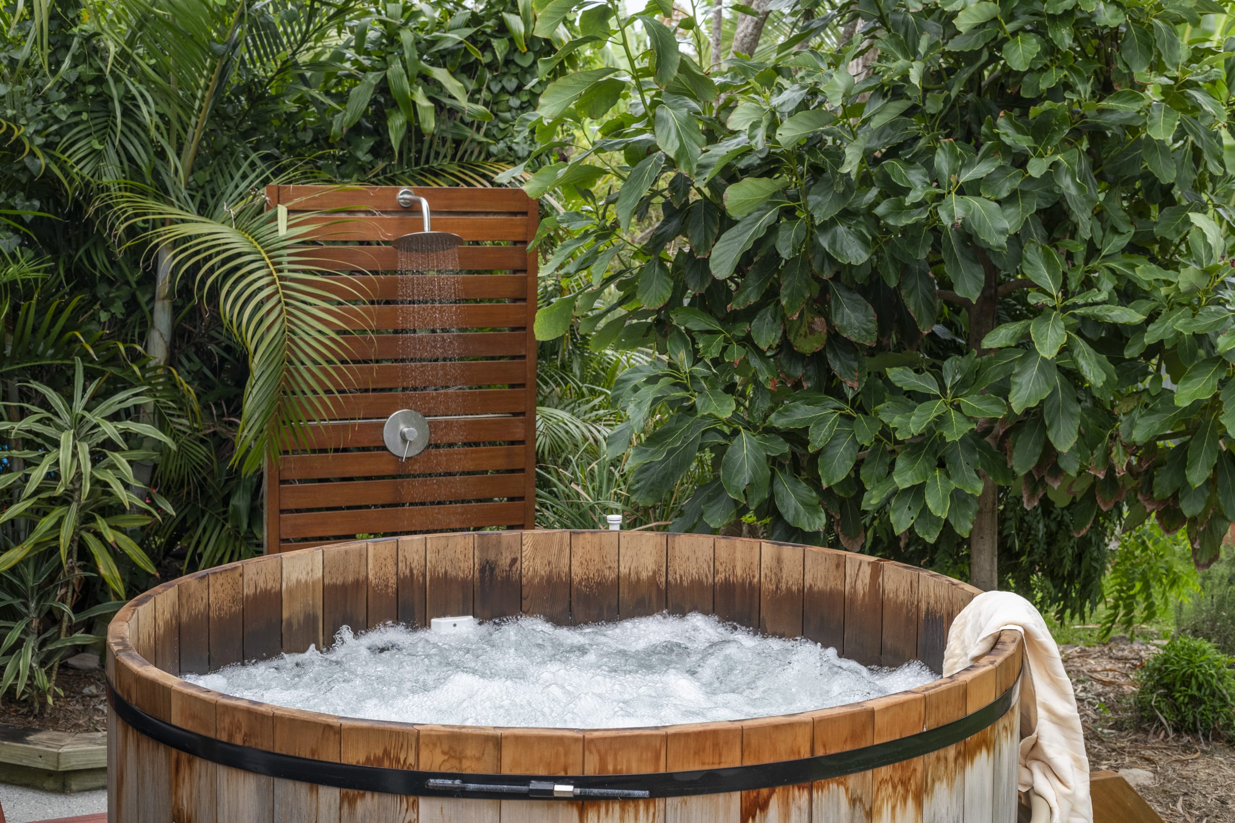 Captain's Haven - Yamba pet-friendly accommodation - Outdoor heated hot tub overlooking rear garden