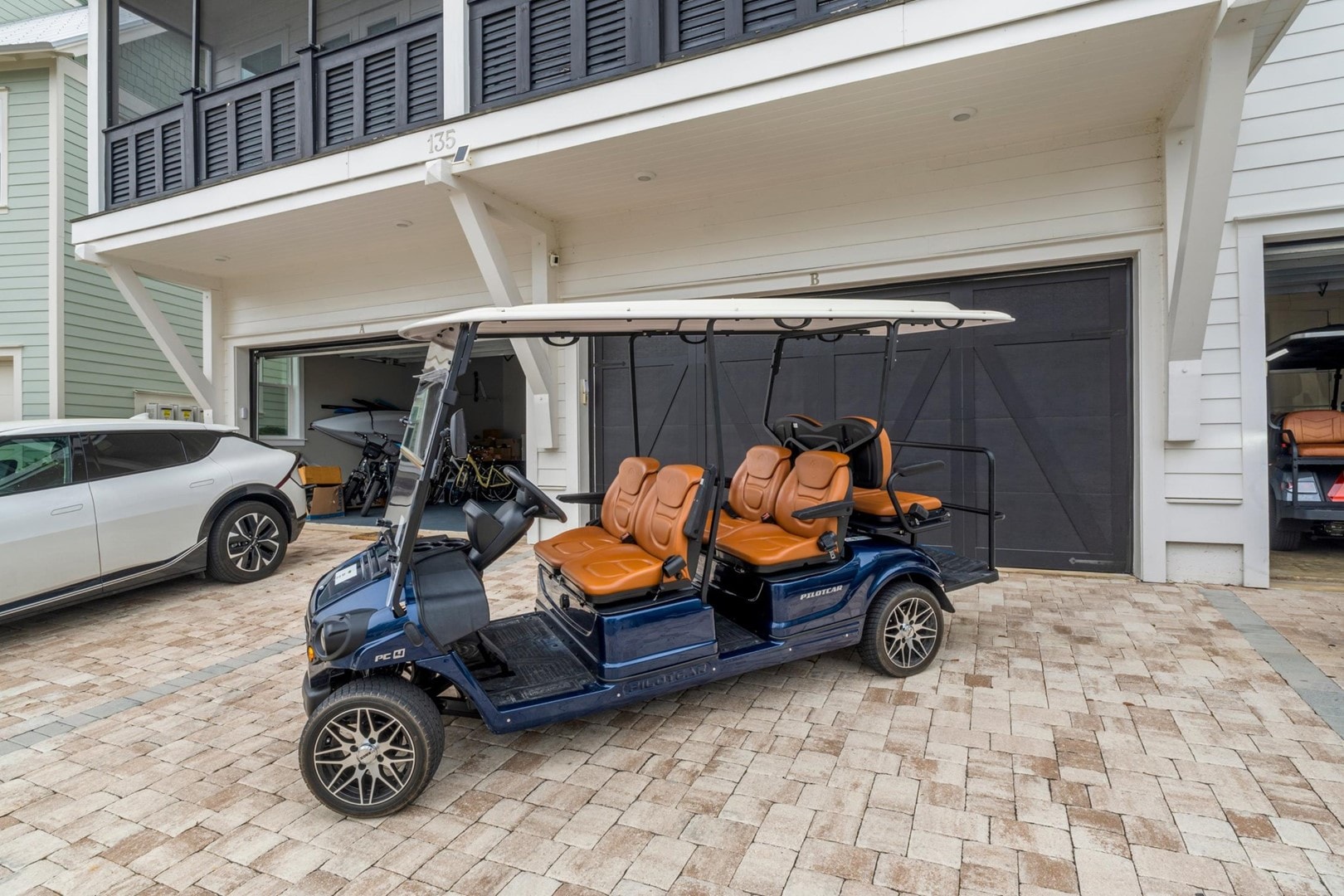 6 Seater Golf Cart Included with Your Rental!