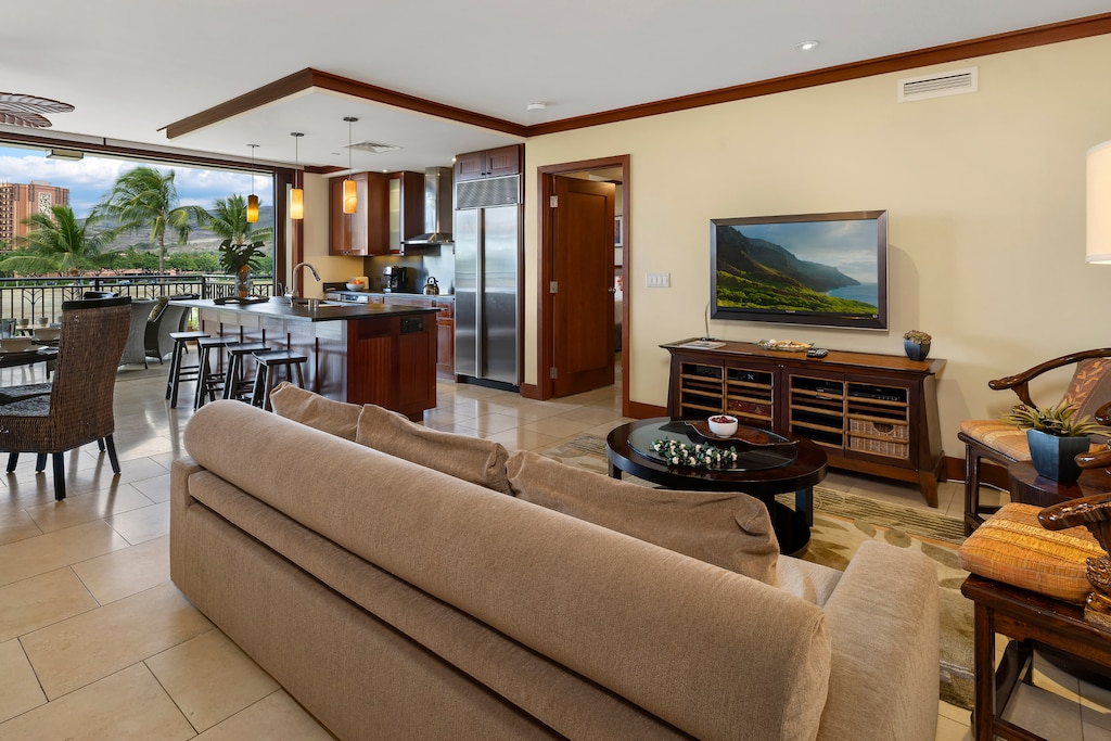 Seamless living in the beautifully furnished living room that overlooks the kitchen and dining room