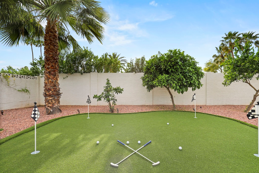 Practice your short game on the backyard putting and chipping green!