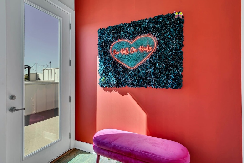 Welcome to your colorful Nashville retreat! Our luxury vacation rental greets you with a sassy neon sign, perfect for bachelorette pics. Enjoy skyline views from the terrace and book your adventure with Misfit Homes! 