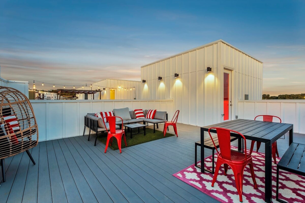 Relax and enjoy the city skyline from this rooftop deck.
