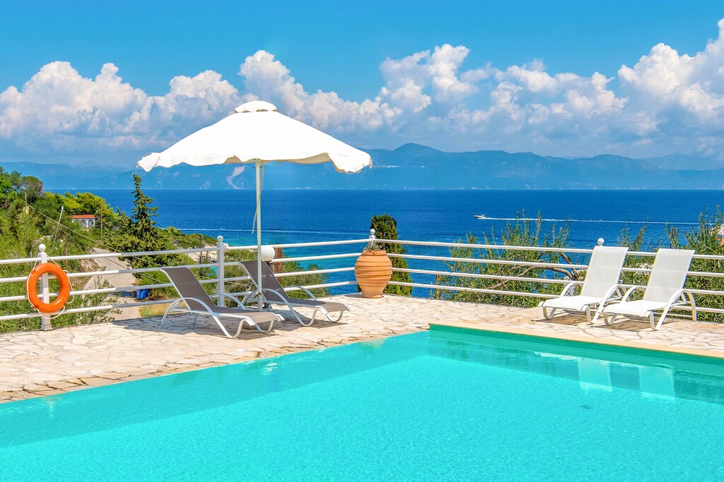 Enjoy a pool view at Stelios