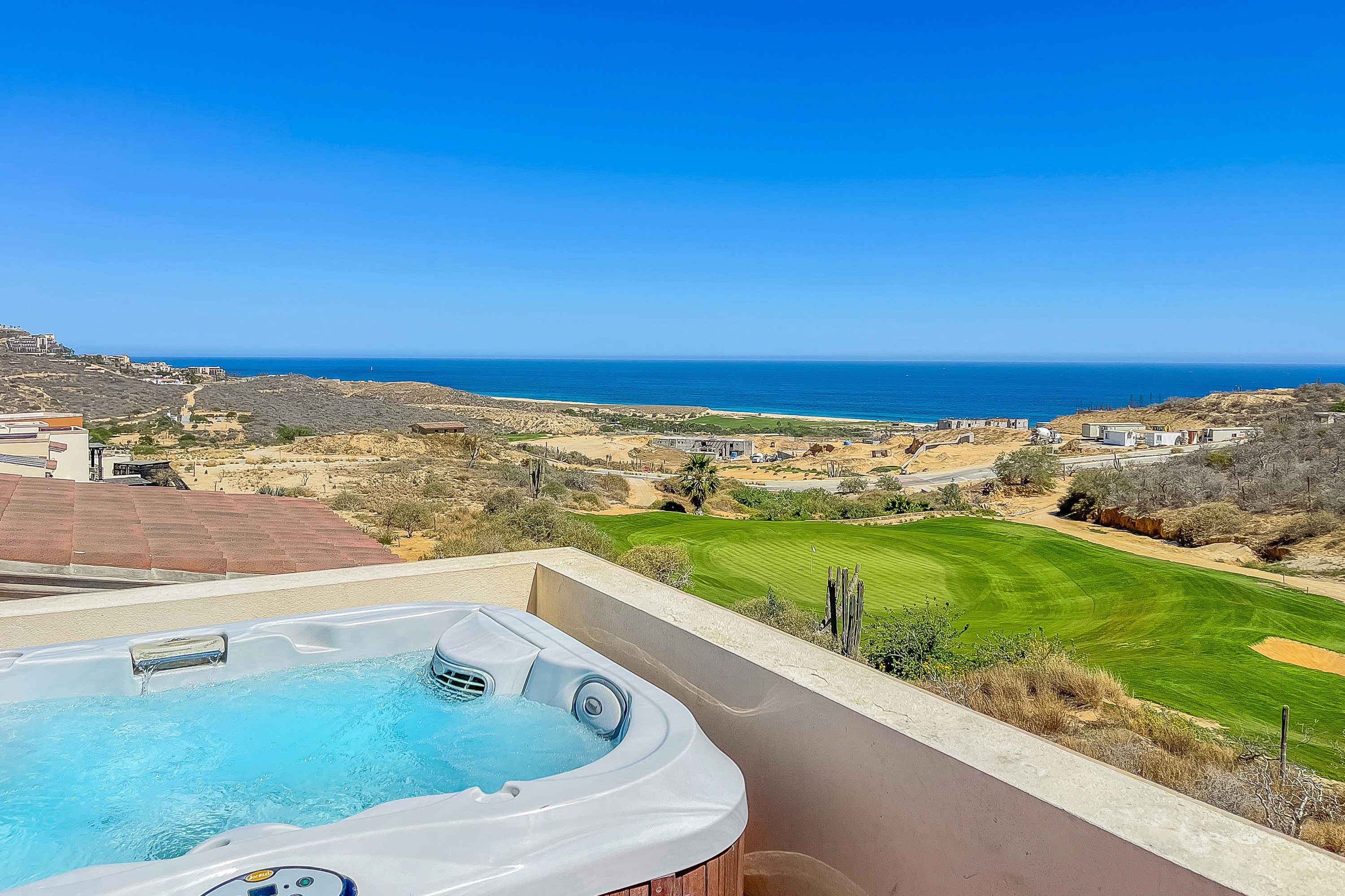 Rooftop terrace with hot tub and fire pit