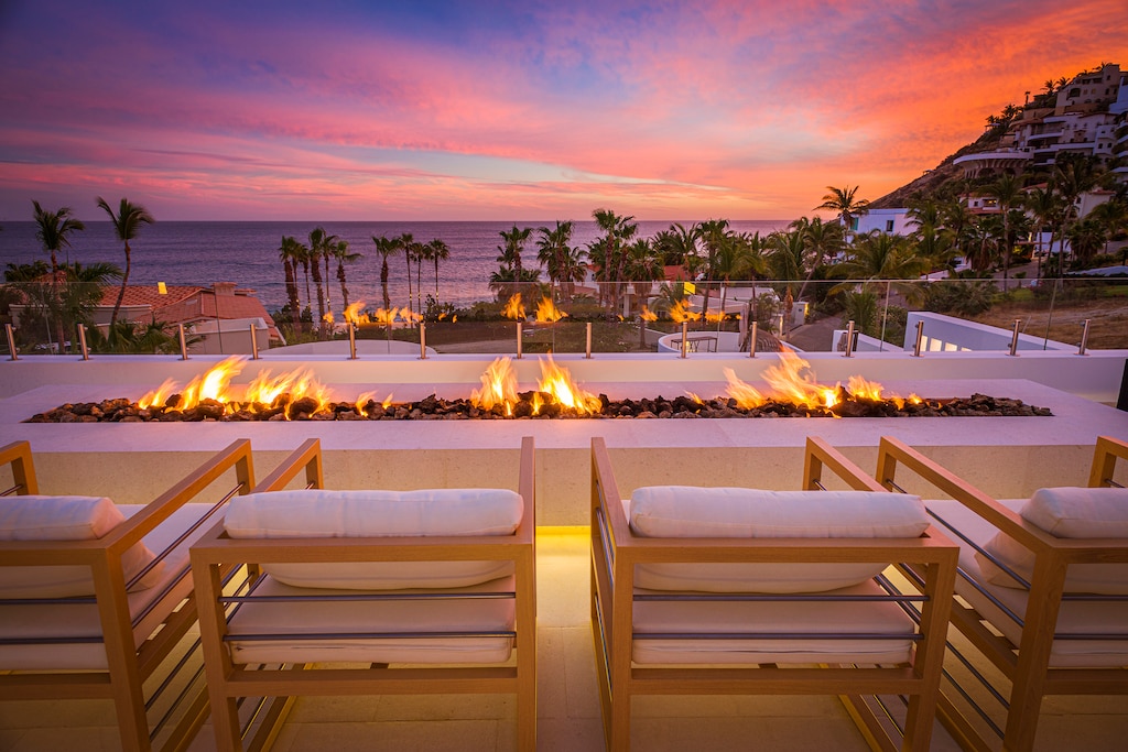 Firepit seating with ocean view during sunset