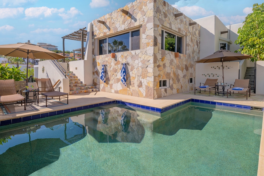 Lounge by the sunny poolside