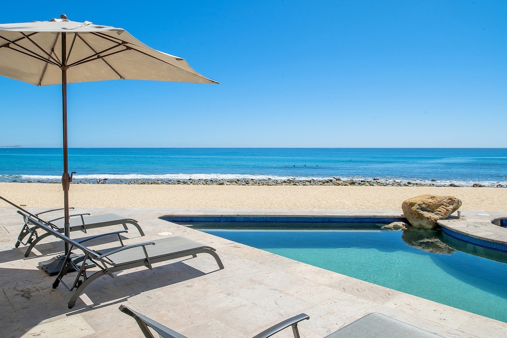 Incredible beachfront patio with pool and jacuzzi