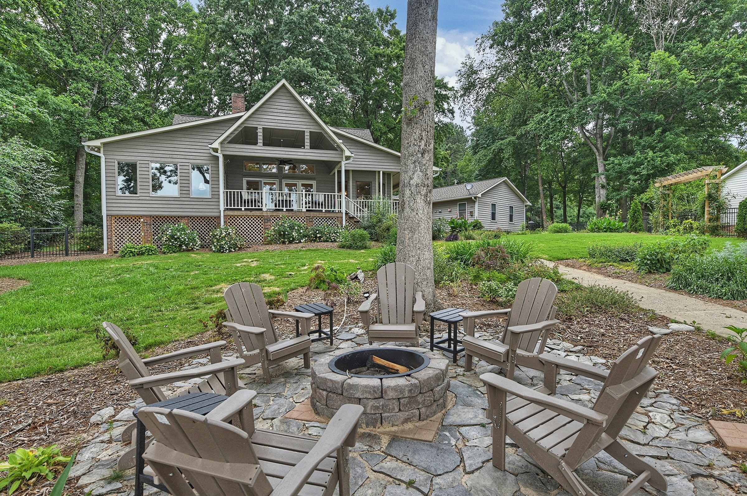 A built-in fire pit with ample seating for everyone. (Firewood provided)