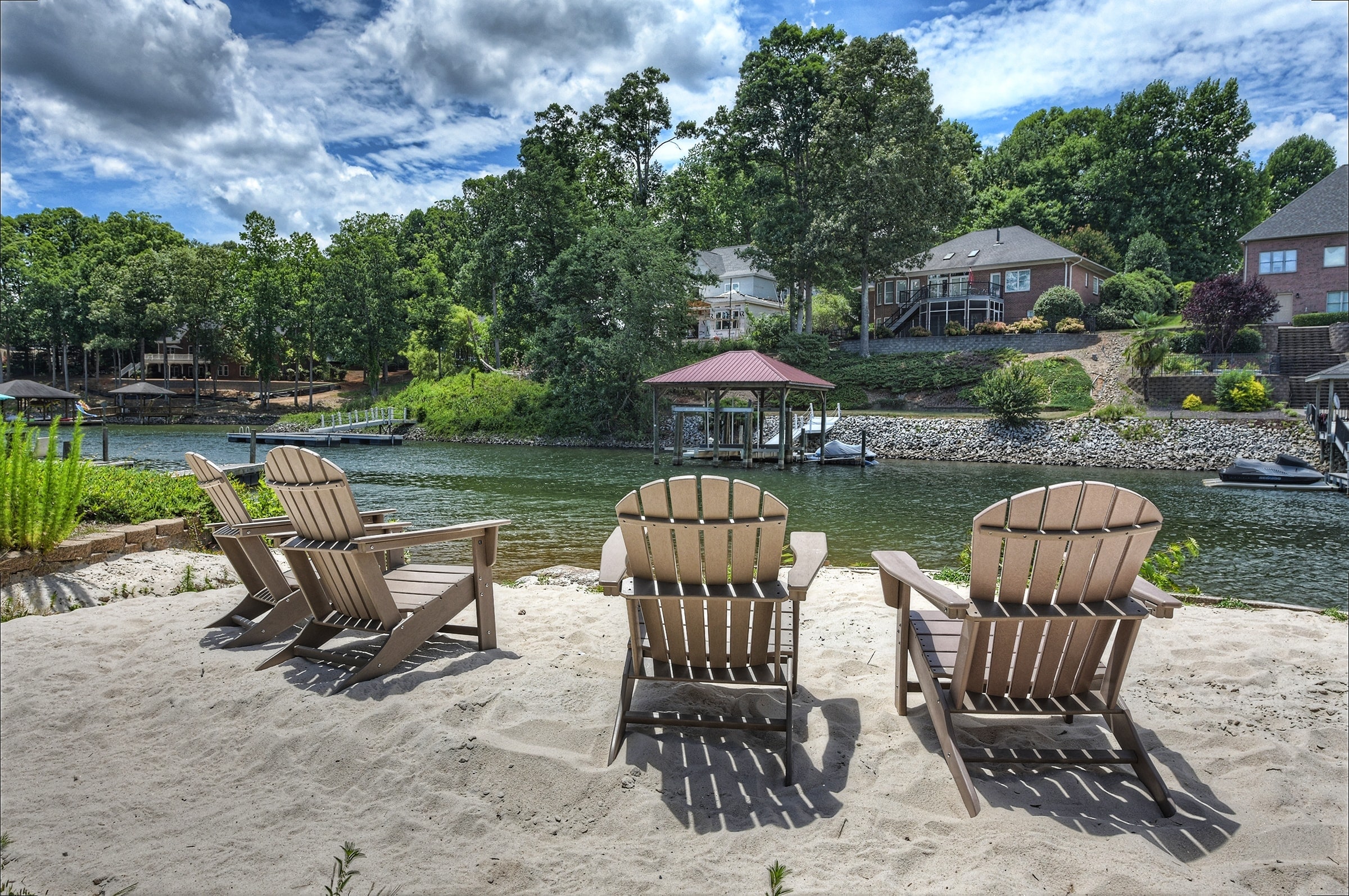 Taking a seat by the serene waters in your lakeside beach. 