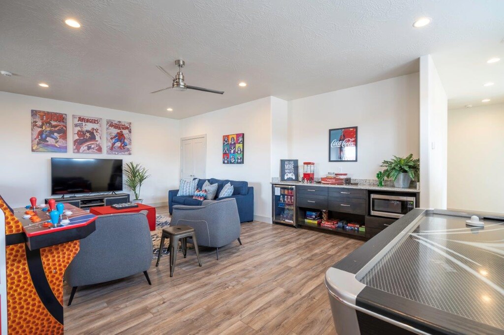 Upstairs living room features many entertainment amenities