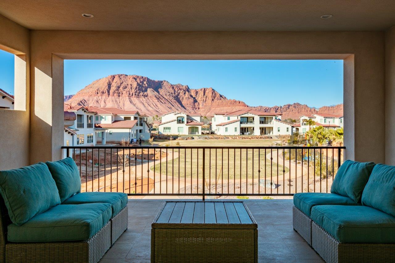 Insanely beautiful views of the Red Mountain from the balcony of this home (see next photo to view amenity area that now occupies the lawn space)