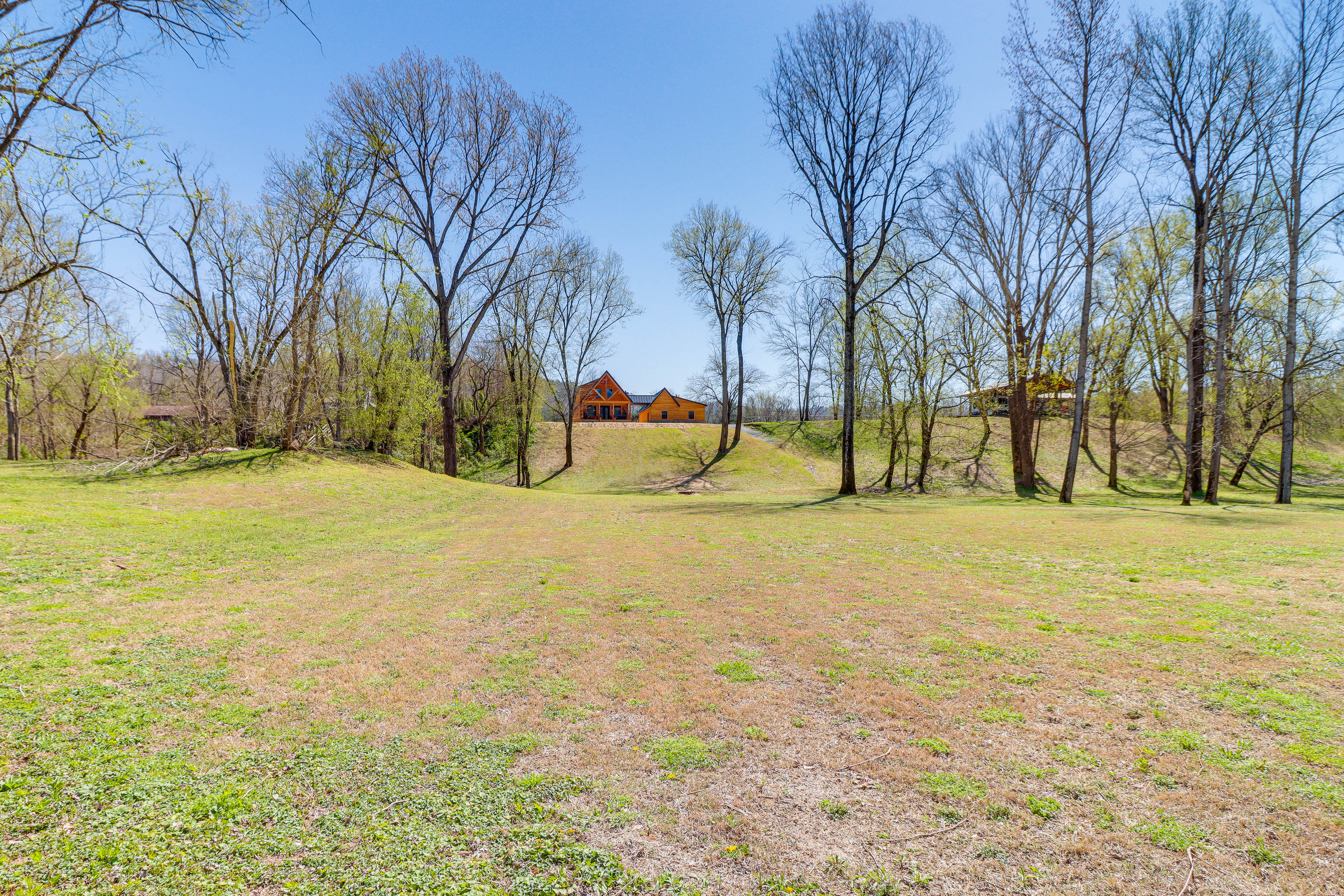 Property Image 1 - Riverfront Mountain View Cabin w/ Deck & Grill!