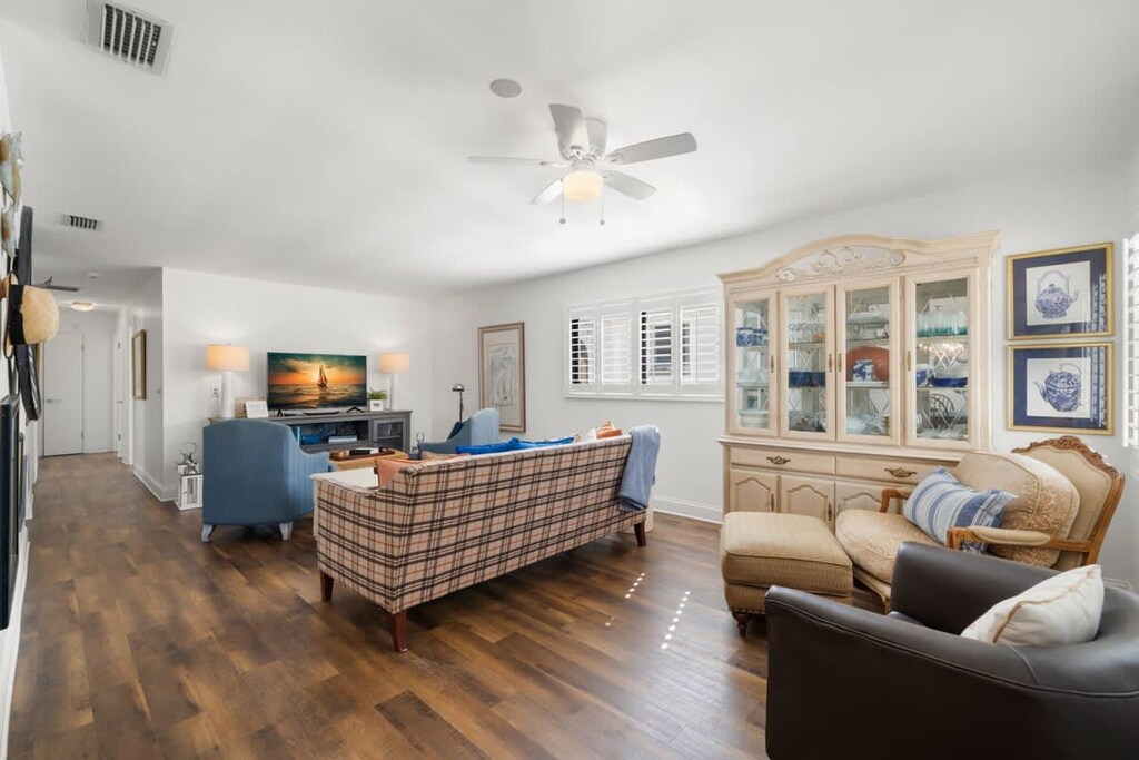 Sunlit Living Room with Flatscreen TV