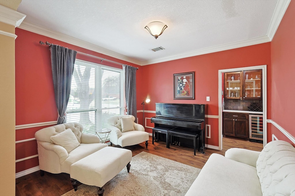 Furnished with elegant white furniture and a piano for your playing pleasure, this graceful living room is perfect for engaging conversations and thoughtful discussions.
